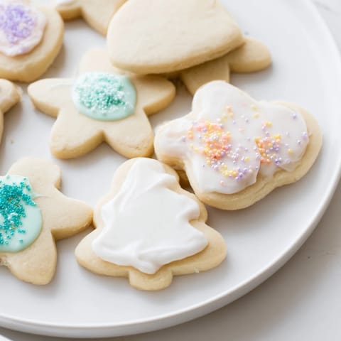 Deliciously decorated sugar cookies with colorful icing and sprinkles, ready to enjoy.